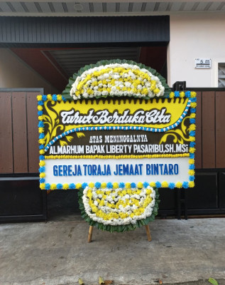 Papan Bunga Duka di Tayando Langgiar